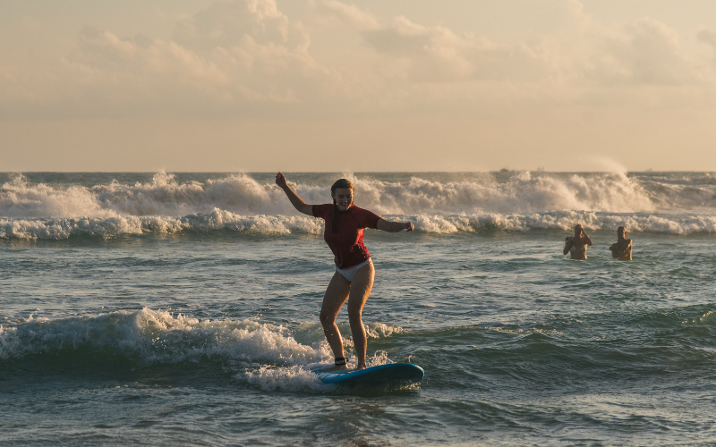 Surfing at sunrise in Habaraduwa